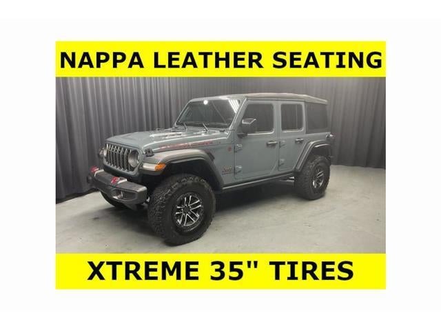 2024 Jeep Wrangler Rubicon in Blue — front three-quarter view